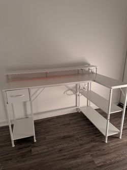 White 53” L-Shaped Desk with LED Lights, Shelves & Outlets