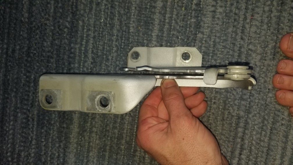 Evo X passenger side hood hinge