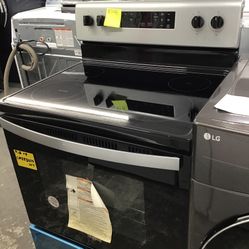New Scratch And Dent Whirlpool 4 Burner Glass Top Stainless Steel Range. 1 Year Warranty 