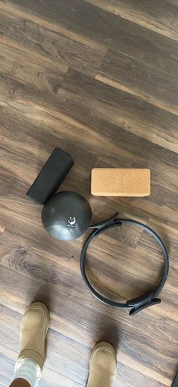 pilates ring, exercise ball and yoga blocks