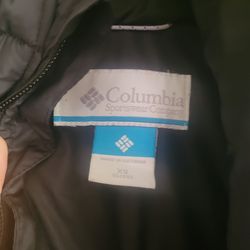 Columbia coat and bluey rainshoes