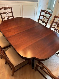 Cherrywood dining table and chairs and hutch – Broyhill