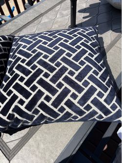 Two large blue throw pillows.