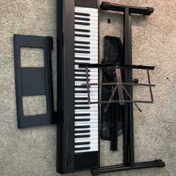 Yamaha NP12 61-Key Portable Keyboard for Sale with PA130 Power Adapter and Stand - Black