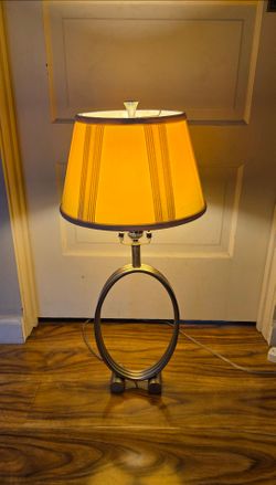 Metal base modernist style table lamp
