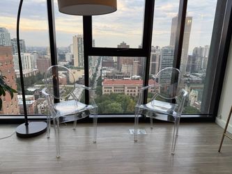 CB2 ghost acrylic chairs
