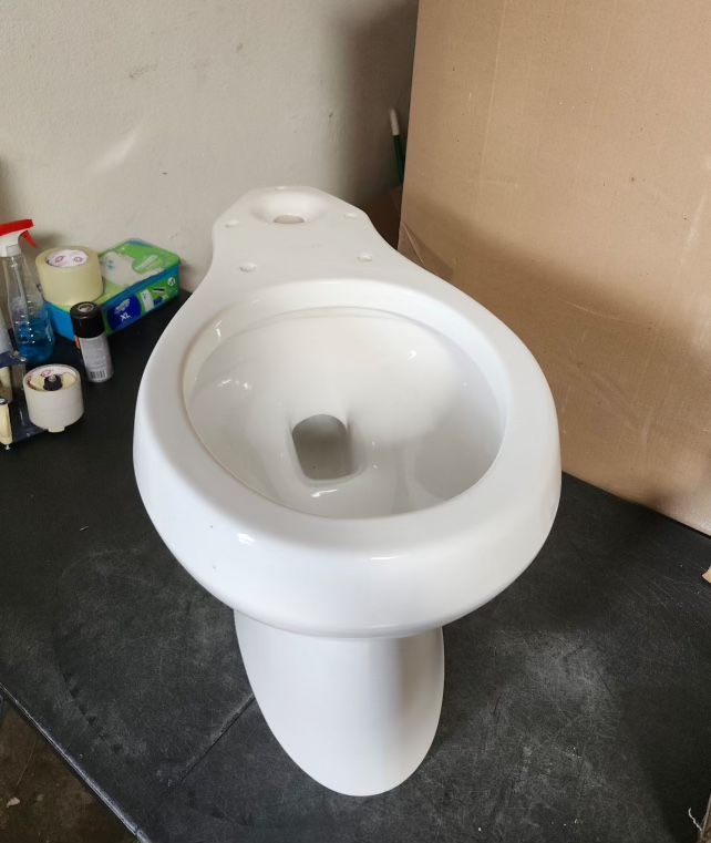 KOHLER Highline Arc 10 in. Rough In 2-Piece 1.28 GFP Single Flush Round Chair Height Toilet in White with Soft Close Seat