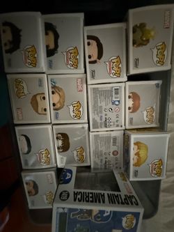 Whole box 27 funko pops with some soda pops