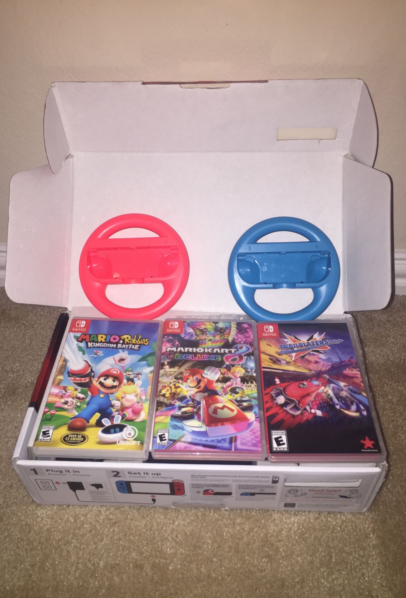 Nintendo Switch, 3 Games, and 2 Racing Wheels