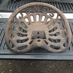 Vintage Cast Iron Tractor Seats
