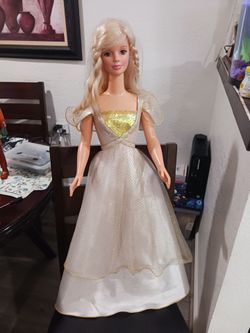 1992 Mattel " My size" Barbie doll.  3 feet  tall.  Long hair. white and gold gown.  Vintage.  Collectible.  Good condition.