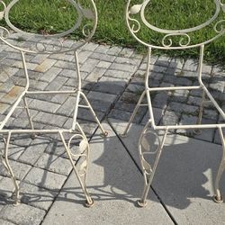 2 White Frame Metal Chairs