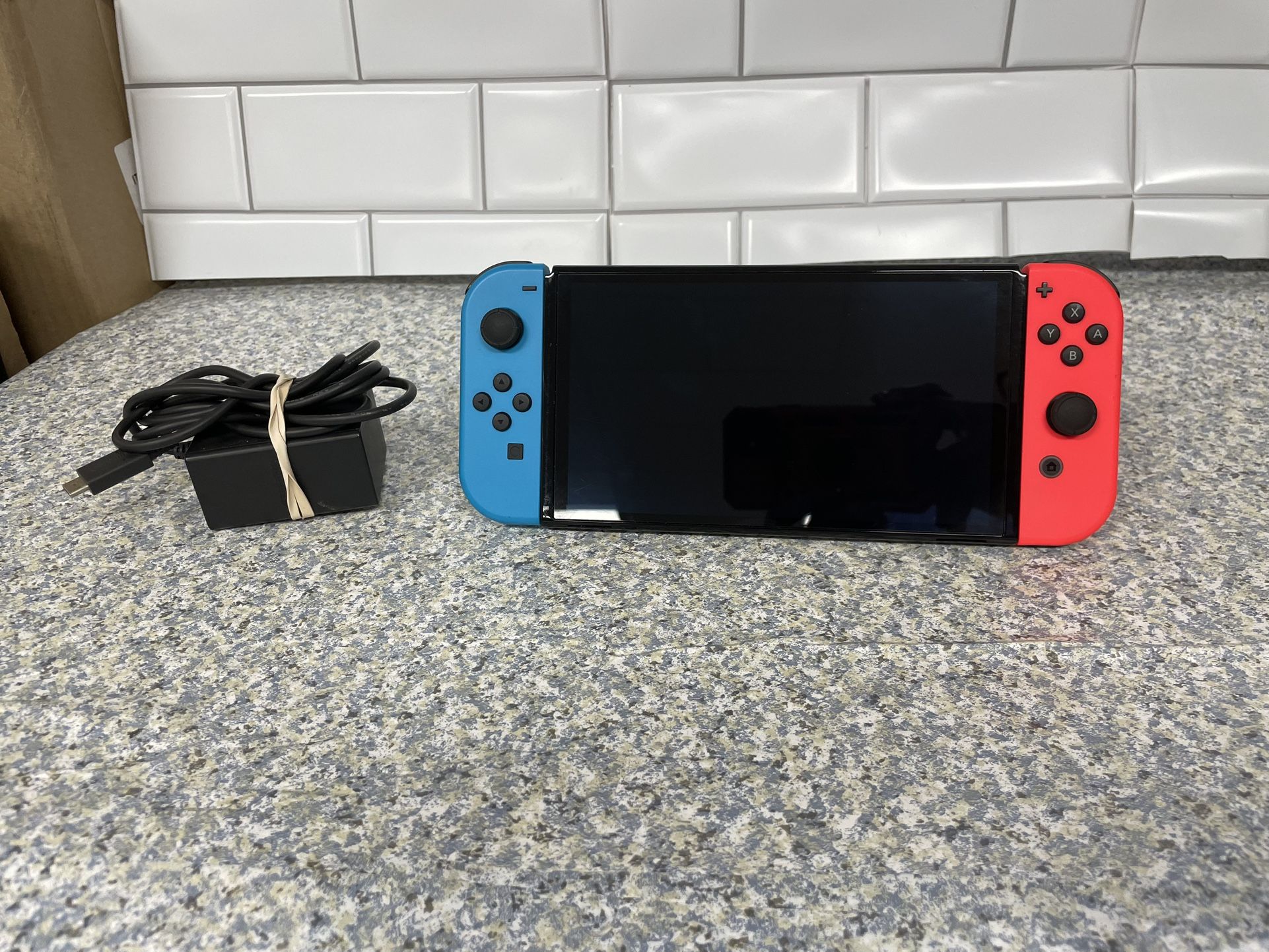 OLED Nintendo Switch 128 gb without docking station no offers or trades please!!!