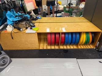 570lbs bumper weights and bench storage