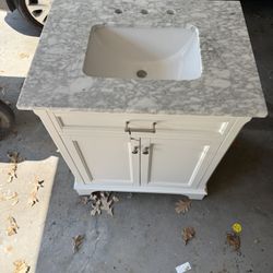 Marble Top Vanity 30”w, 22”l, 35”h