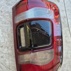 Dodge RAM 1500 Left Tail Light Lid Oem