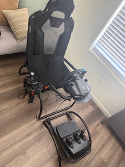 Logitech G923 for ps4/ps5 with seat.