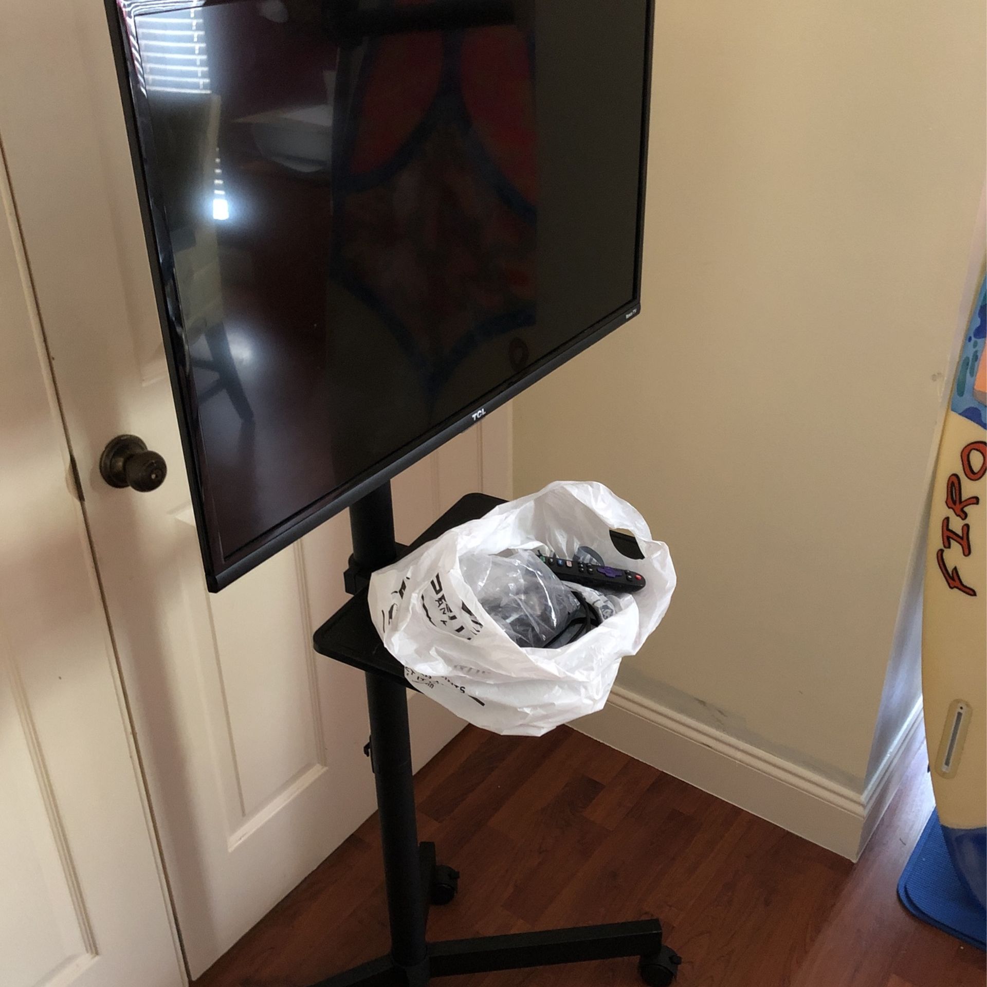 TCL  32” Television With Stand