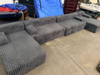Gray two piece Sectional cloud Couch Black four piece Sectional cloud Couch