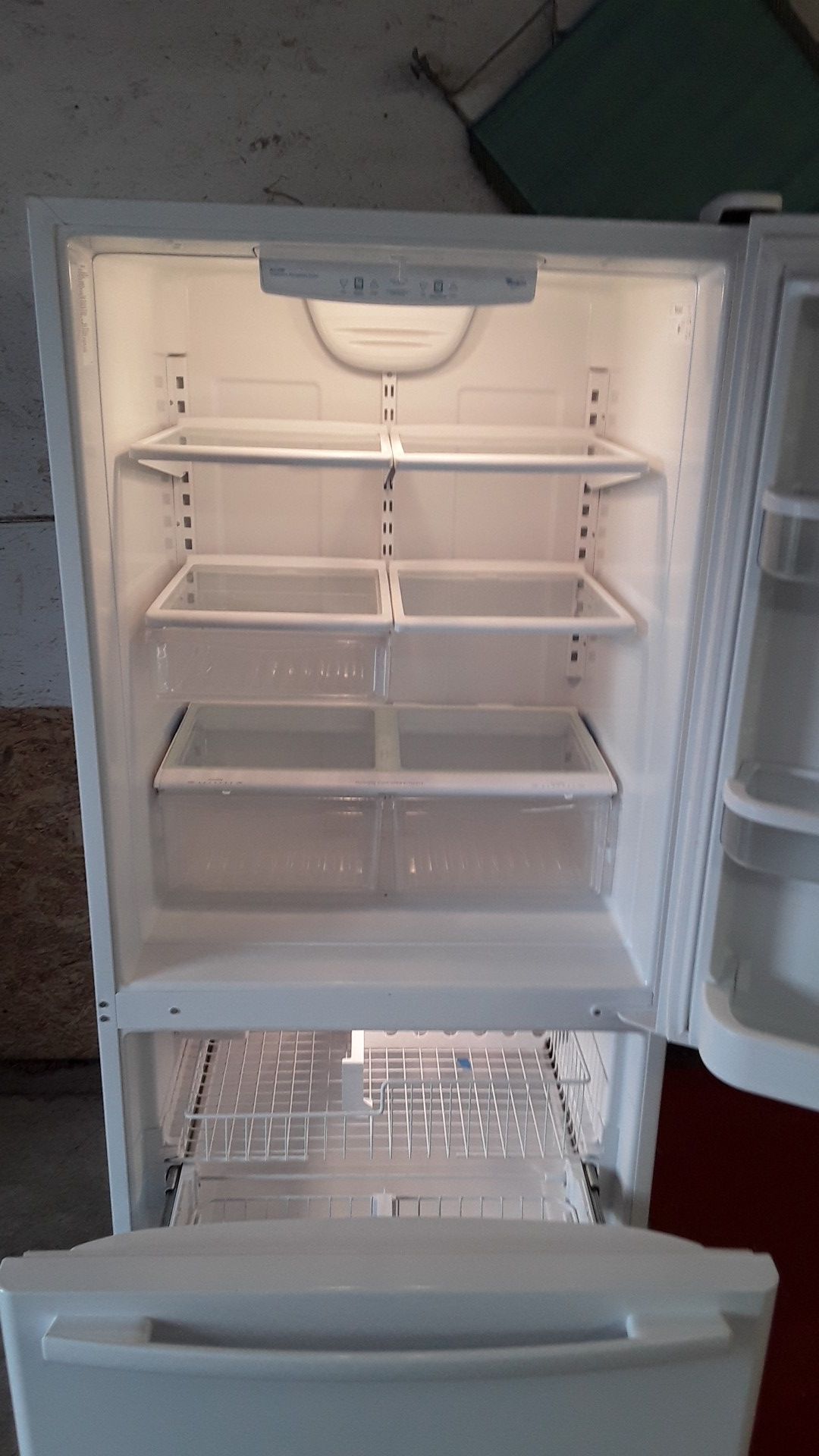 Beautiful 22 cubic foot bottom freezer pull out Whirlpool Gold with ice maker