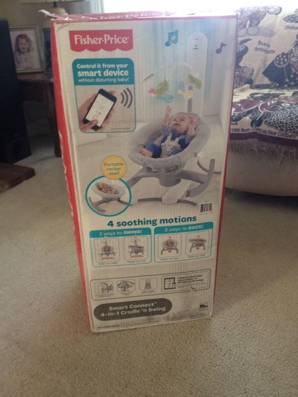 Baby's grey fisher price 4 soothing box rocker