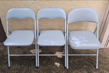 lot of 3 folding chairs (FAIR condition due to 1 rip and paint marks) $10 FIRM for ALL!