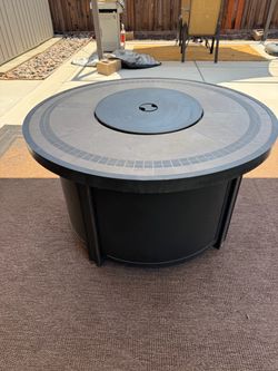 Gently used propane patio fire pit table