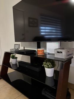 Black Glass TV Stand / Entertainment Center