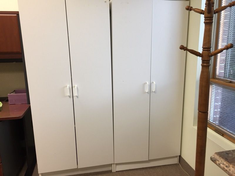 White 6’ free- standing cabinets