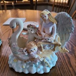 music boxes.  message me for prices please.   sold Lighthouse and teeter totter
