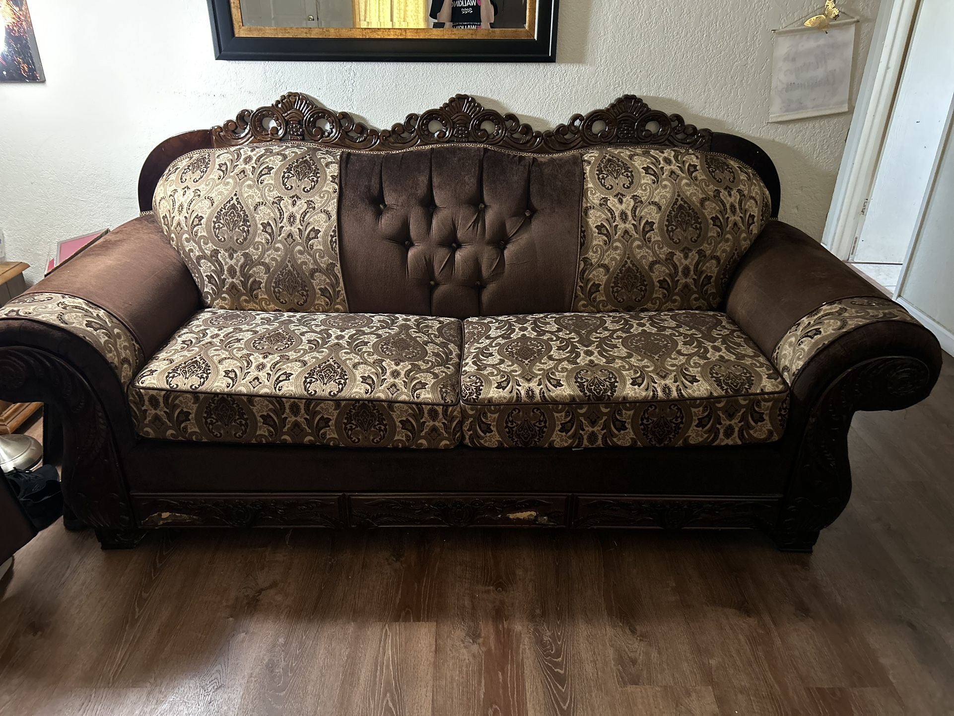 big and small brown two couch set