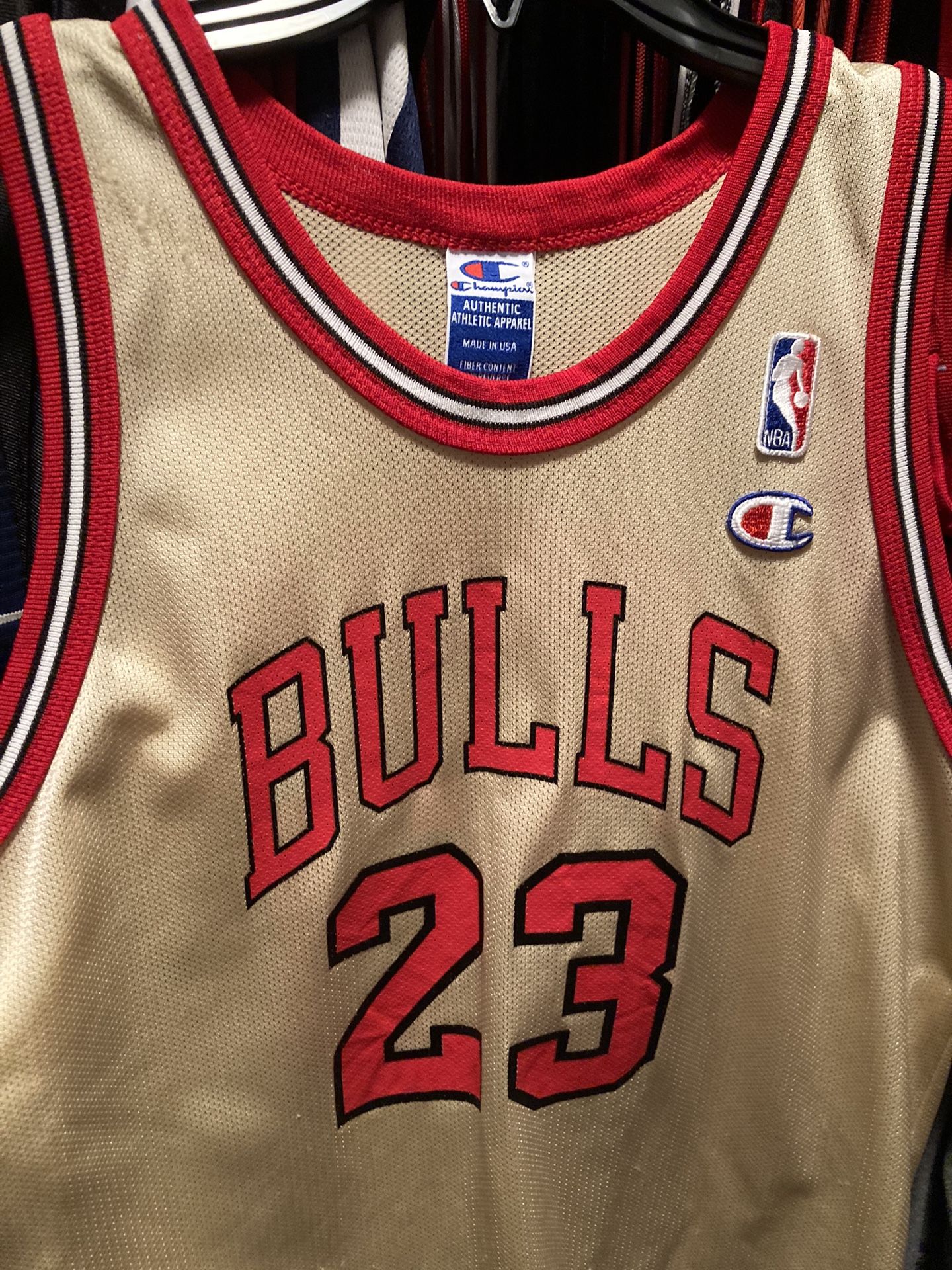 Vintage 90s Chicago Bulls Michael Jordan number 23 gold champions jersey youth L 14 16 Fan