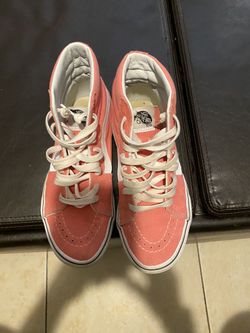 Pink and white Vans high top