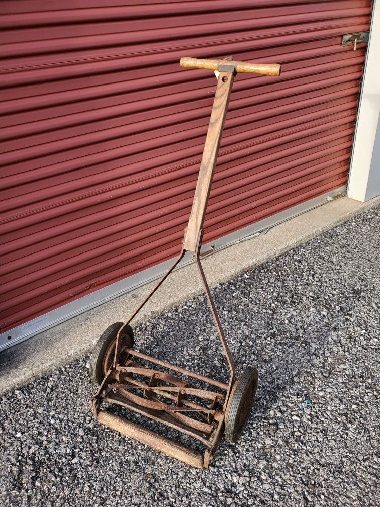 Vintage Reel Type push lawn clipper / mower. Still works! Great decoration for yard or garden