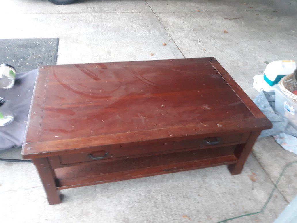 Free large heavy coffee table. It's sitting in the driveway 3214 94th Street South Lakewood 98499. First come first serve.
