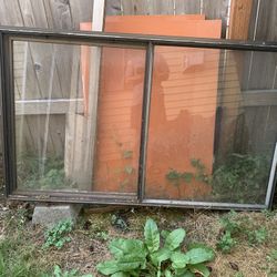FREE. OLD BUT GOOD 48"X60" SLIDING WINDOW. 