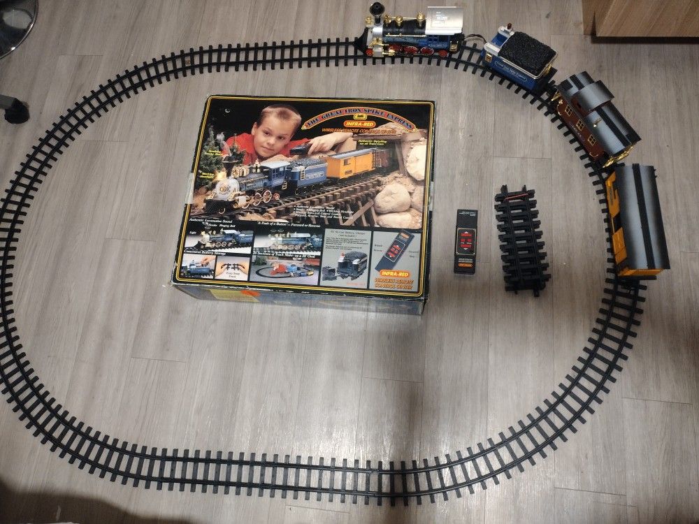 THE GREAT IRON SPIKE EXPRESS CHRISTMAS TRAIN WITH REMOTE CONTROL