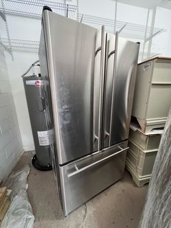 Stainless steel fridge in working condition
