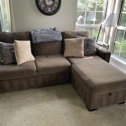 Brown L Shaped Couch with pull out/storage