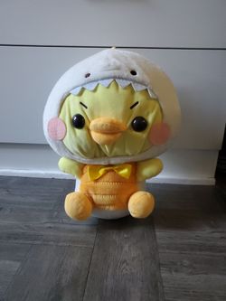 Duck in dino costume plush