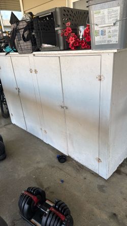 Wood cabinet for outdoor storage