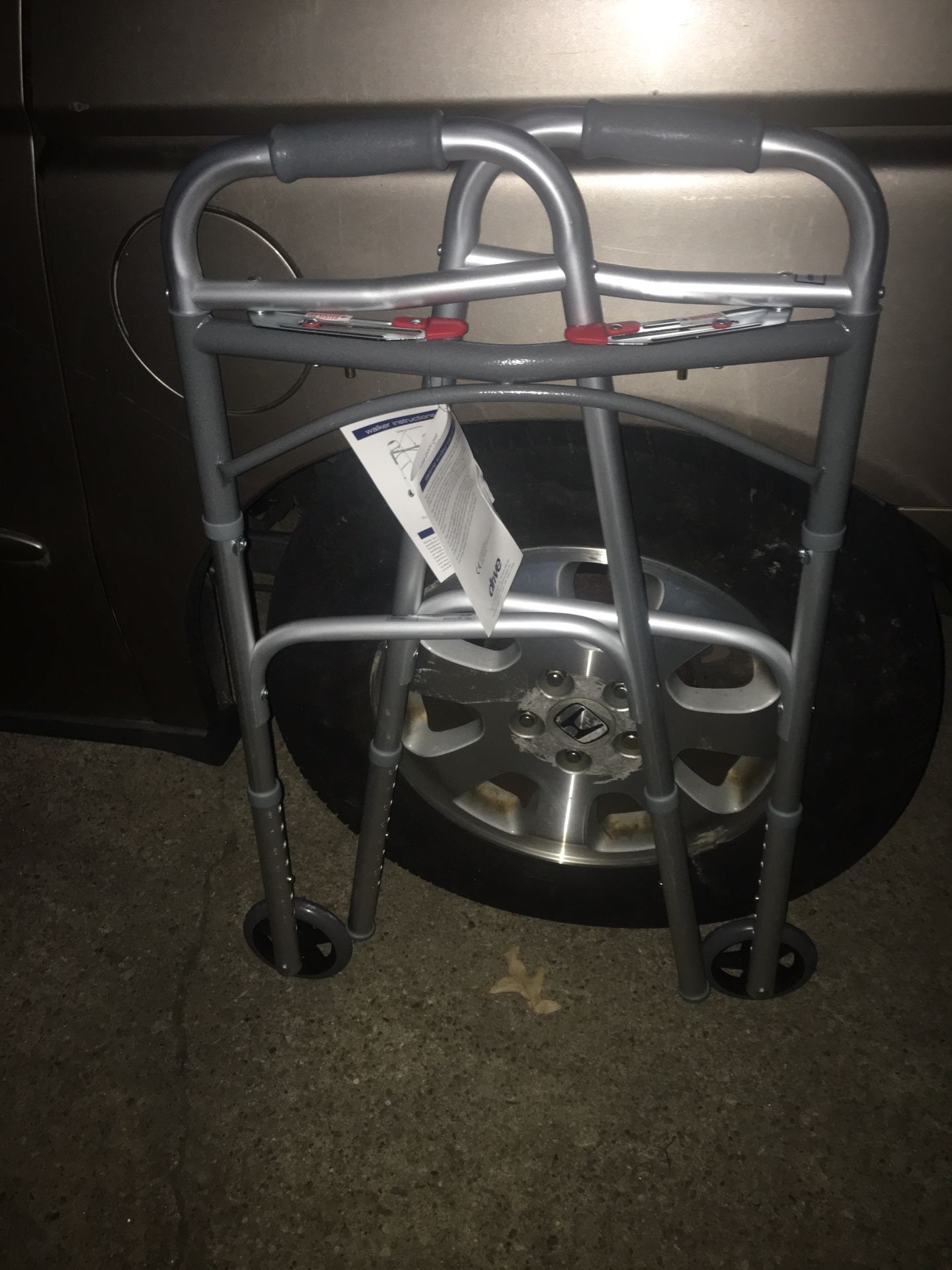 New folder adjustable walker with wheels only $25 firm