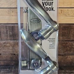 Larson antique brass quick fit door handle
