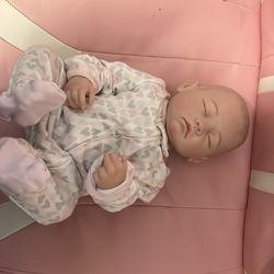Realistic baby doll
