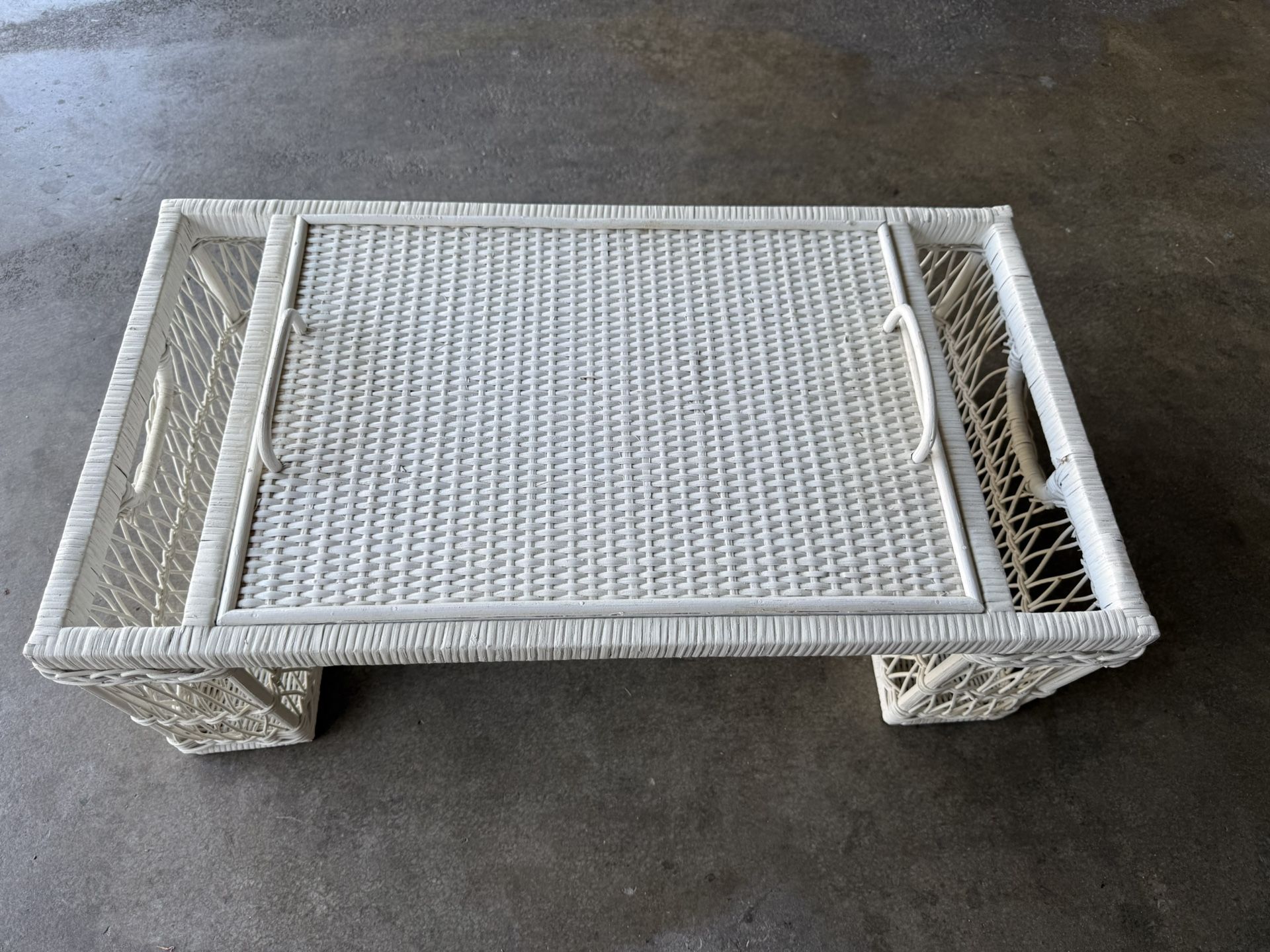 Elegant white wicker coffee table. Beautiful Vintage White Wicker Coffee Table. Just $18. Great condition 👍. Hurry won’t last long…