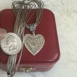 925 Sterling silver Carolyn Pollack Heart ❤️pendant w/ 925 Sterling silver vintage Native Am. Liquid silver chain, 10 strands , marked w/ sun Sterling