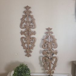 Faux wood decorative sconces. One has some peeling