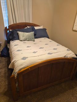 Full size bed with mattress and box spring headboard and footboard and dresser for sale