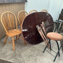 A Big, Nice Table With 4 Wooden Strong Chairs , And An Extra Little High Chair All For $70