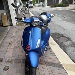 Blue 2021 Vespa With Matching Bubble Case